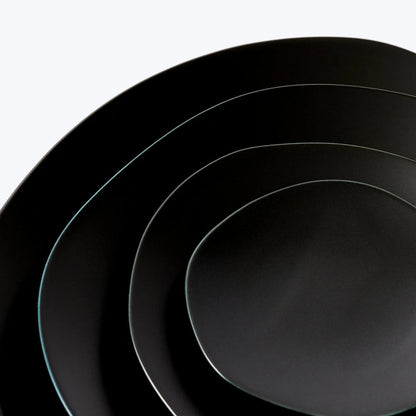 Handmade Japanese porcelain leaf plate – modern feuille design ceramic tableware for elegant dining or decor.