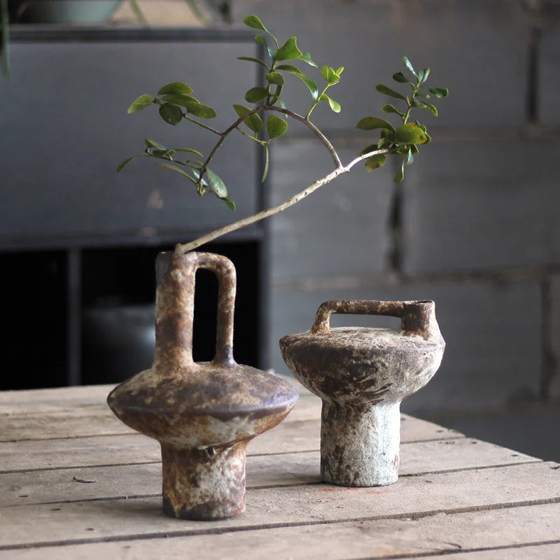 Handcrafted Japanese rough pottery ceramic vase with wabi-sabi aesthetic.