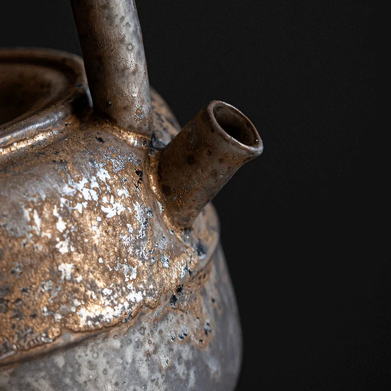 Handcrafted Japanese stoneware teapot with natural earthy design, perfect for brewing green, black, or herbal teas.