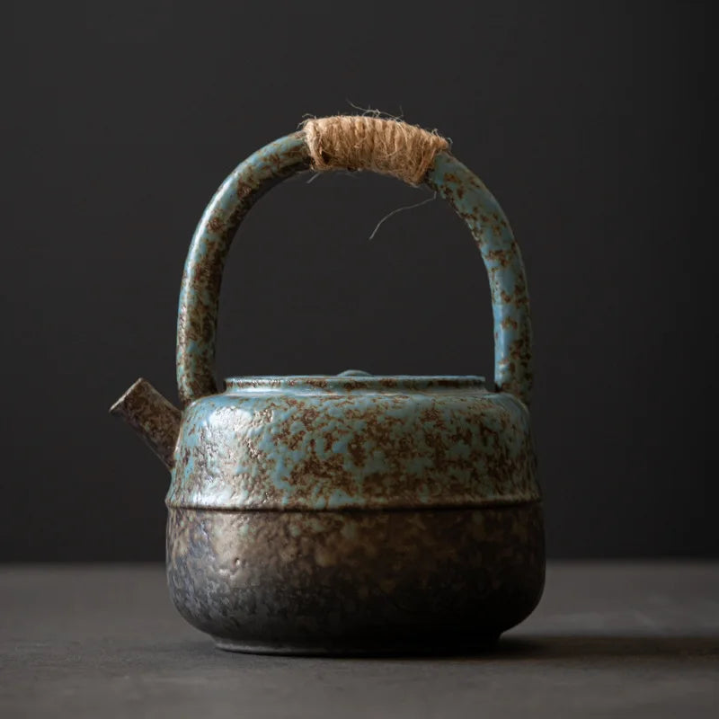 Handcrafted Japanese stoneware teapot with natural earthy design, perfect for brewing green, black, or herbal teas.