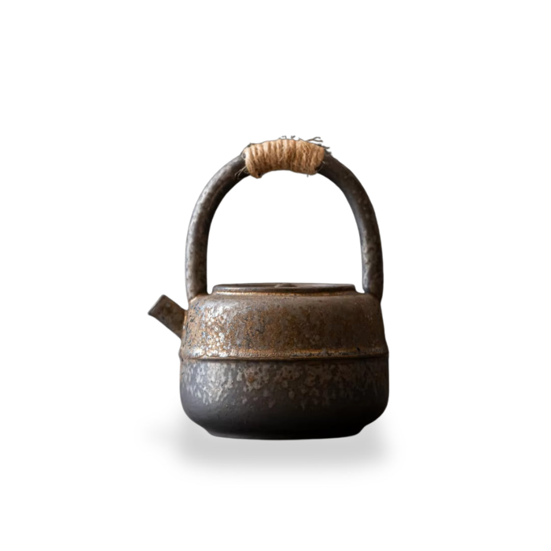 Handcrafted Japanese stoneware teapot with natural earthy design, perfect for brewing green, black, or herbal teas.