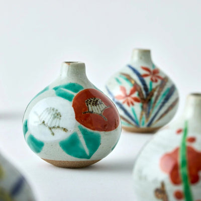 Handcrafted Japanese ceramic flower vase, wabi-sabi ikebana kabin with susuki motif for minimalist home decor.