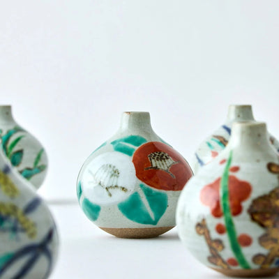 Handcrafted Japanese ceramic flower vase, wabi-sabi ikebana kabin with susuki motif for minimalist home decor.