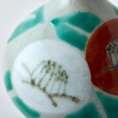Handcrafted Japanese ceramic flower vase, wabi-sabi ikebana kabin with susuki motif for minimalist home decor.