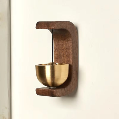 Japanese wooden doorbell with traditional design, handcrafted for a stylish and functional addition to home entrance decor.