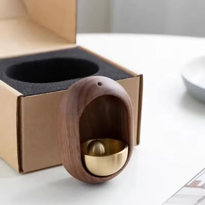 Japanese wooden doorbell with traditional design, handcrafted for a stylish and functional addition to home entrance decor.