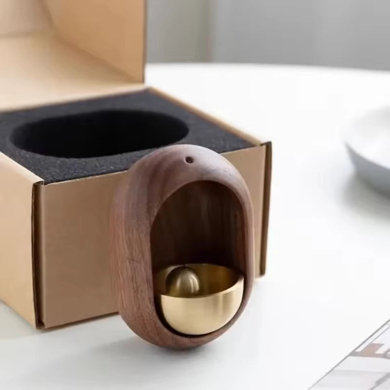 Japanese wooden doorbell with traditional design, handcrafted for a stylish and functional addition to home entrance decor.