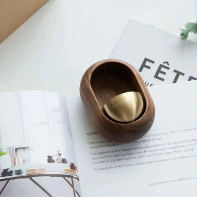 Japanese wooden doorbell with traditional design, handcrafted for a stylish and functional addition to home entrance decor.