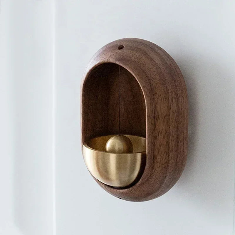 Japanese wooden doorbell with traditional design, handcrafted for a stylish and functional addition to home entrance decor.