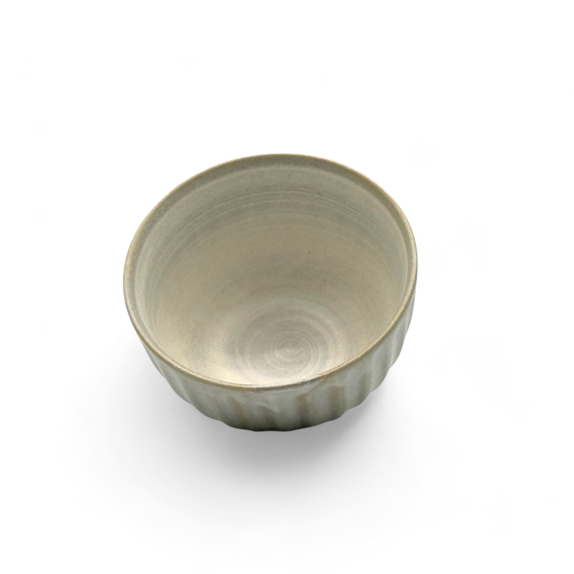 Handcrafted Mino-yaki Yunomi Japanese Sencha teacup with traditional glaze, perfect for daily tea rituals.