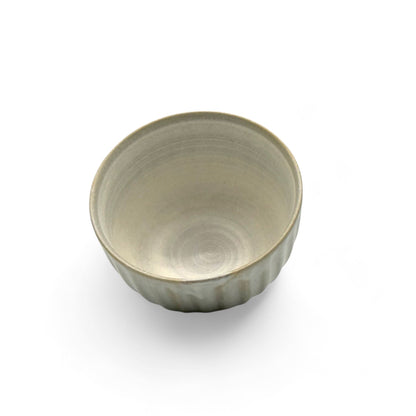 Handcrafted Mino-yaki Yunomi Japanese Sencha teacup with traditional glaze, perfect for daily tea rituals.