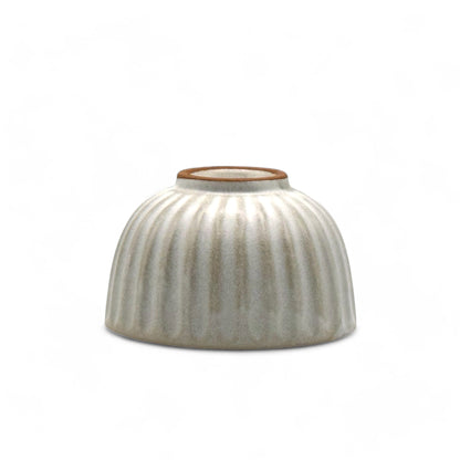 Handcrafted Mino-yaki Yunomi Japanese Sencha teacup with traditional glaze, perfect for daily tea rituals.