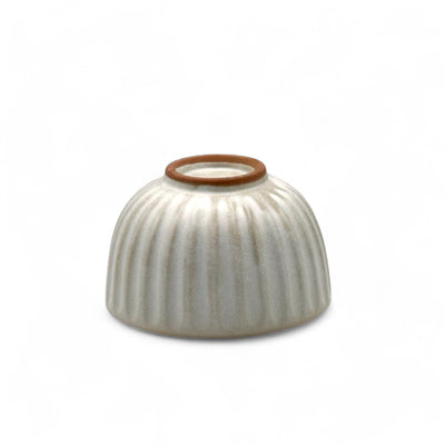 Handcrafted Mino-yaki Yunomi Japanese Sencha teacup with traditional glaze, perfect for daily tea rituals.