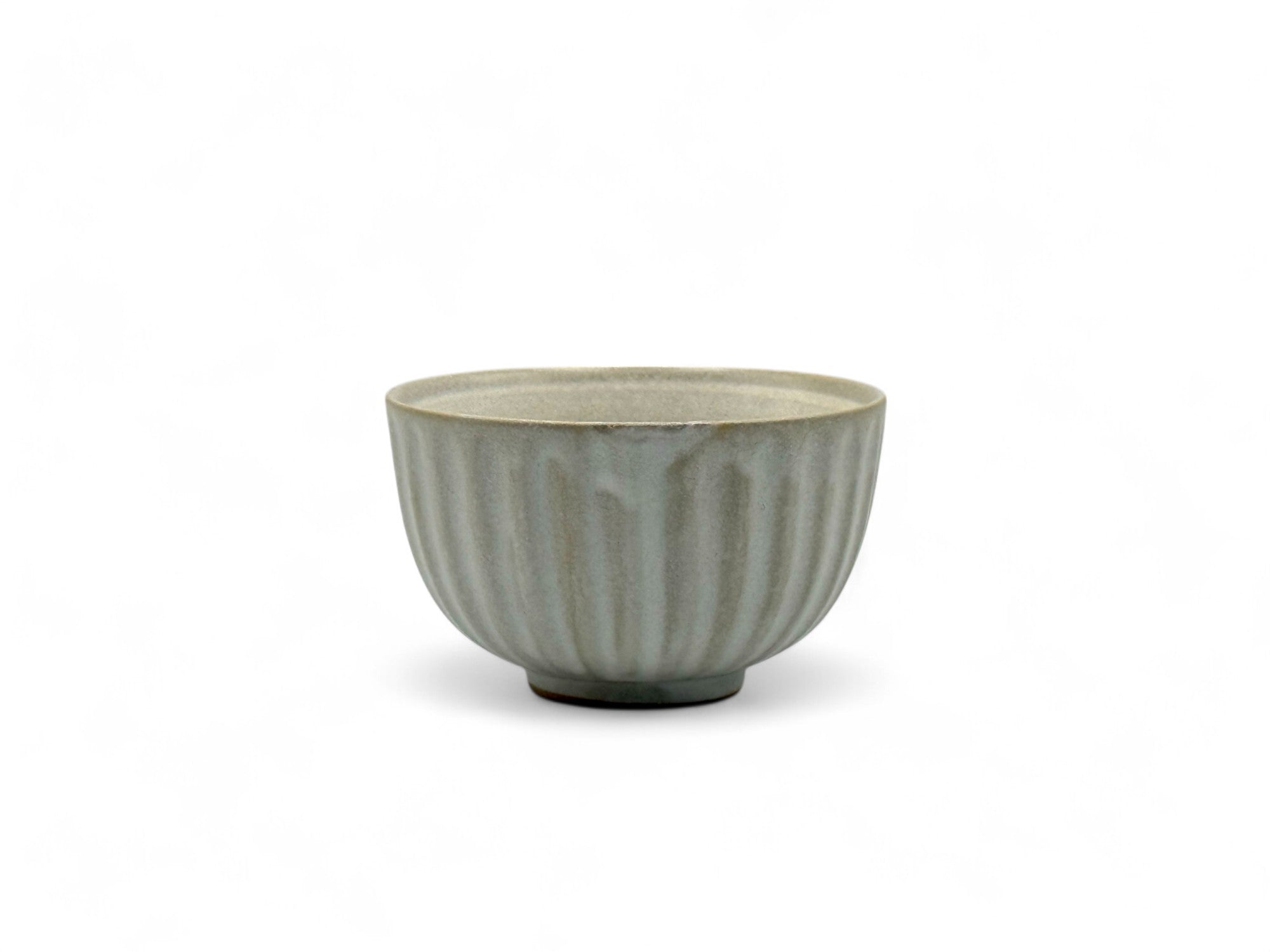 Handcrafted Mino-yaki Yunomi Japanese Sencha teacup with traditional glaze, perfect for daily tea rituals.