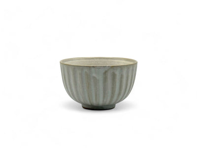 Handcrafted Mino-yaki Yunomi Japanese Sencha teacup with traditional glaze, perfect for daily tea rituals.