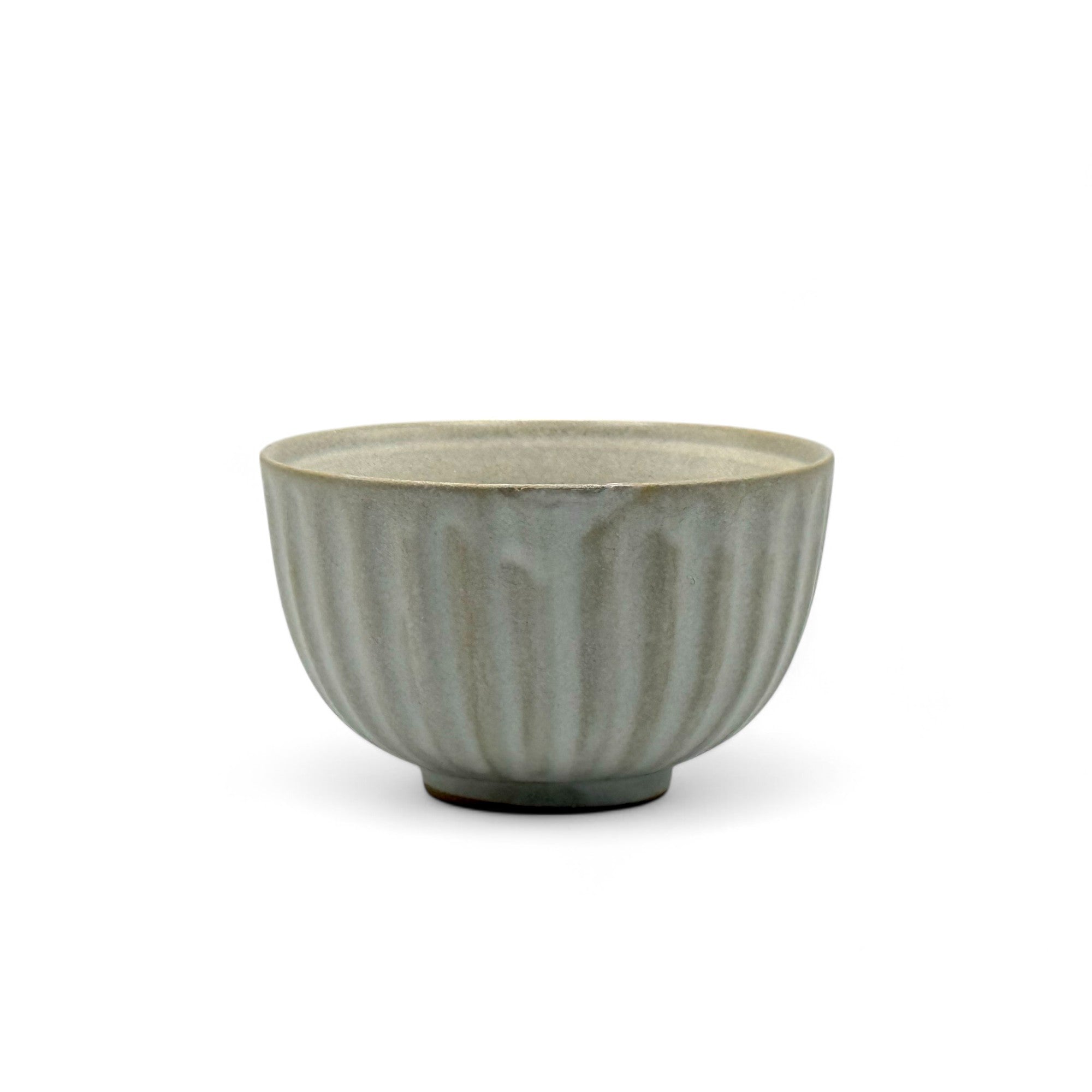 Handcrafted Mino-yaki Yunomi Japanese Sencha teacup with traditional glaze, perfect for daily tea rituals.