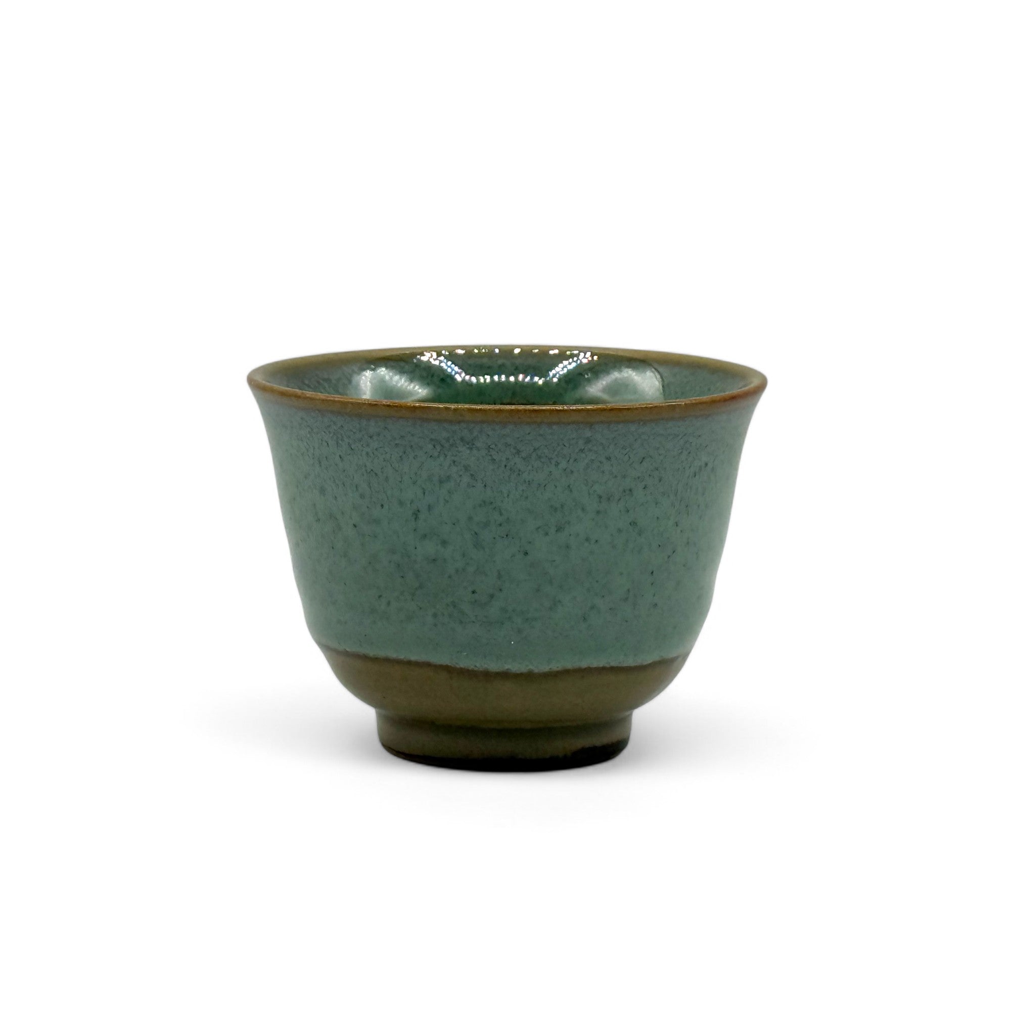 Handcrafted Mino-yaki Yunomi Japanese Sencha teacup with traditional glaze, perfect for daily tea rituals.