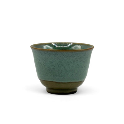 Handcrafted Mino-yaki Yunomi Japanese Sencha teacup with traditional glaze, perfect for daily tea rituals.