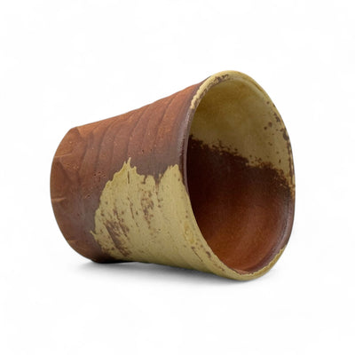 Handcrafted Mino-yaki Yunomi Japanese teacup with traditional glaze, perfect for daily tea rituals.