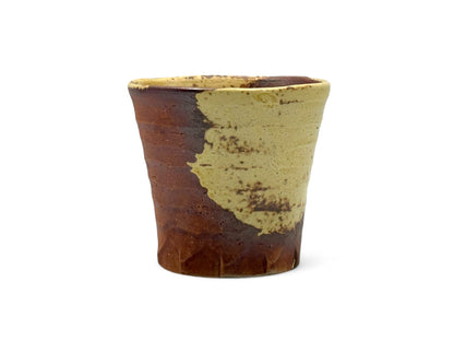 Handcrafted Mino-yaki Yunomi Japanese teacup with traditional glaze, perfect for daily tea rituals.