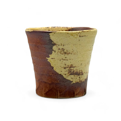 Handcrafted Mino-yaki Yunomi Japanese teacup with traditional glaze, perfect for daily tea rituals.