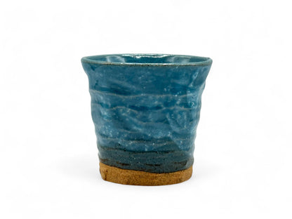 Handcrafted Mino-yaki Yunomi Japanese teacup with traditional glaze, perfect for daily tea rituals.