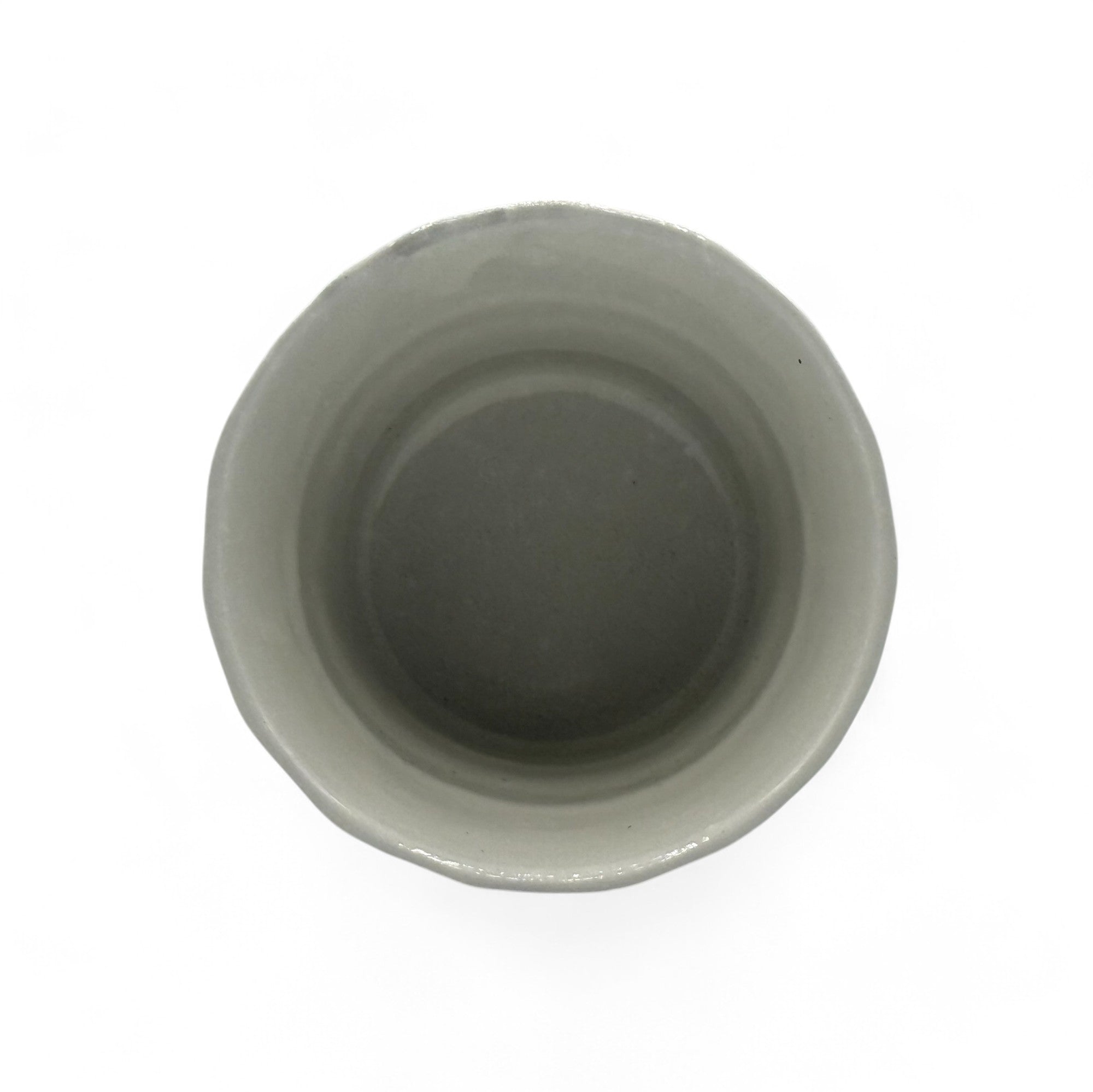 Handcrafted Mino-yaki Yunomi Japanese teacup with traditional glaze, perfect for daily tea rituals.