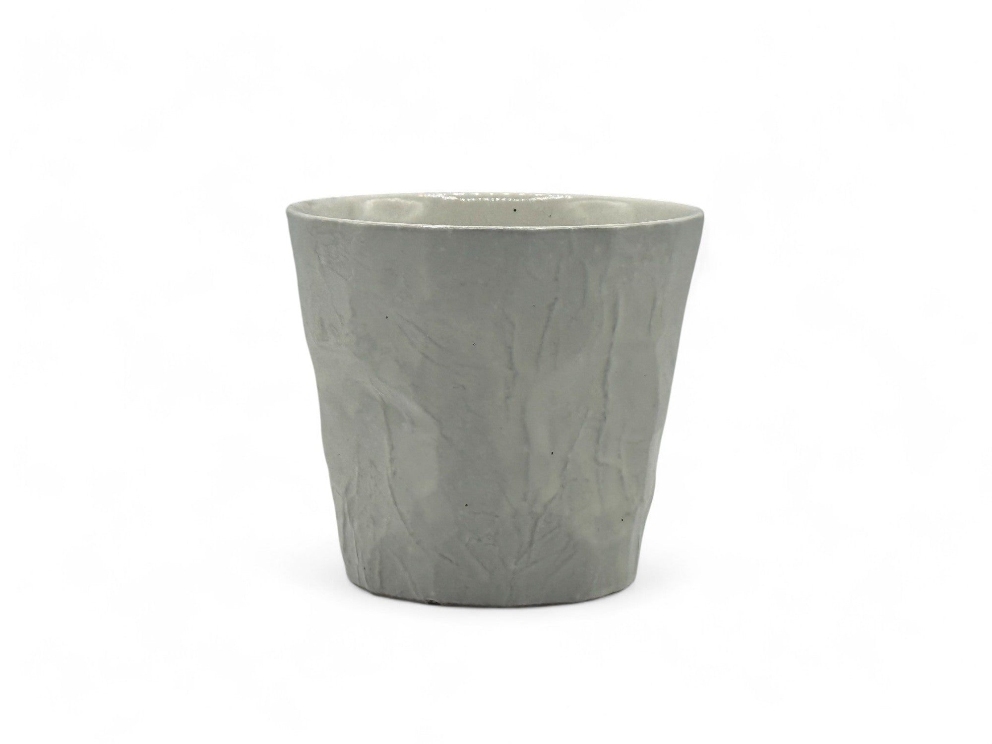 Handcrafted Mino-yaki Yunomi Japanese teacup with traditional glaze, perfect for daily tea rituals.