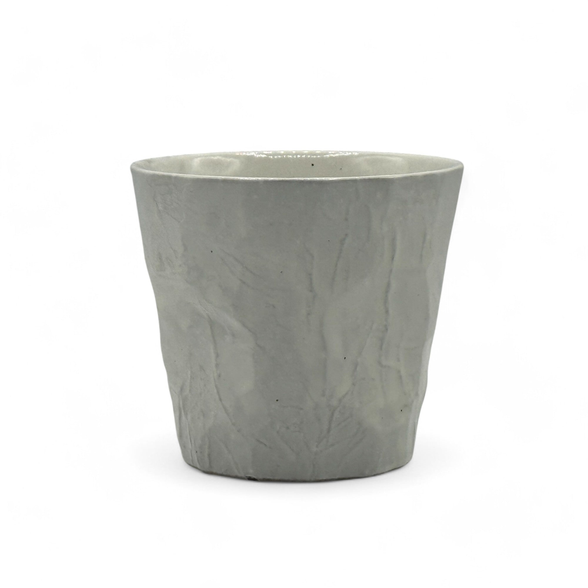 Handcrafted Mino-yaki Yunomi Japanese teacup with traditional glaze, perfect for daily tea rituals.