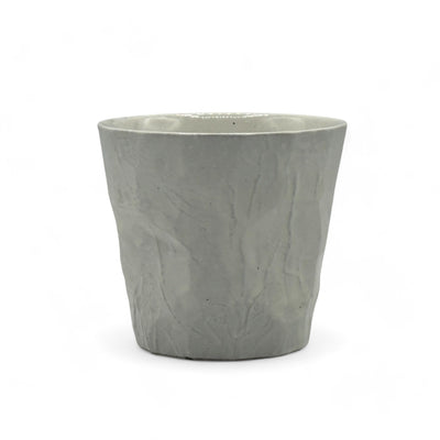 Handcrafted Mino-yaki Yunomi Japanese teacup with traditional glaze, perfect for daily tea rituals.