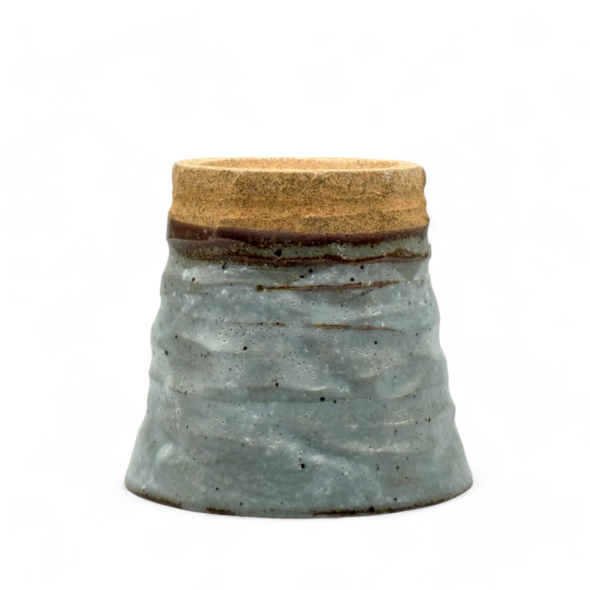 Handcrafted Mino-yaki Yunomi Japanese teacup with traditional glaze, perfect for daily tea rituals.