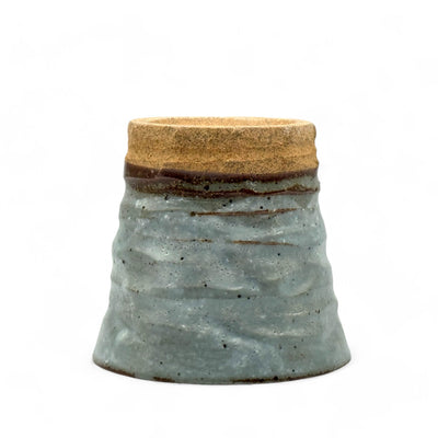 Handcrafted Mino-yaki Yunomi Japanese teacup with traditional glaze, perfect for daily tea rituals.