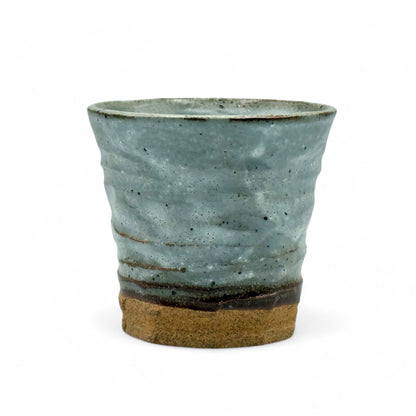 Handcrafted Mino-yaki Yunomi Japanese teacup with traditional glaze, perfect for daily tea rituals.