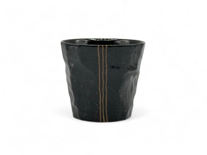 Handcrafted Mino-yaki Yunomi Japanese teacup with traditional glaze, perfect for daily tea rituals.