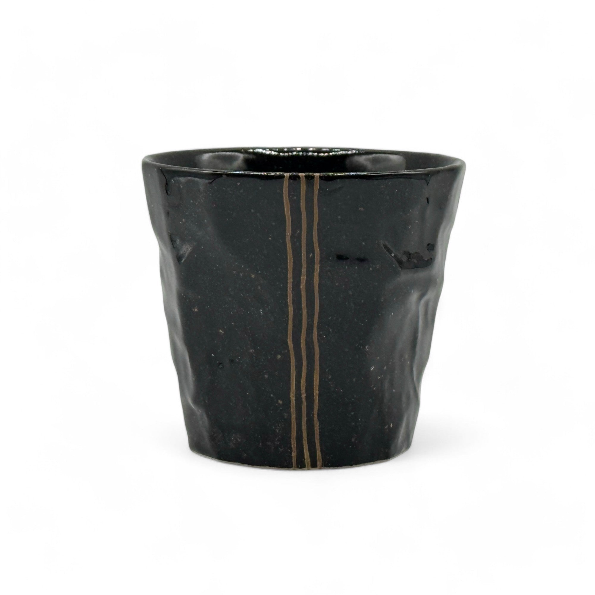 Handcrafted Mino-yaki Yunomi Japanese teacup with traditional glaze, perfect for daily tea rituals.