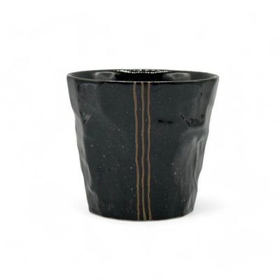 Handcrafted Mino-yaki Yunomi Japanese teacup with traditional glaze, perfect for daily tea rituals.