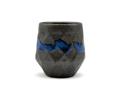 Handcrafted Mino-yaki Yunomi Japanese teacup with traditional glaze, perfect for daily tea rituals.