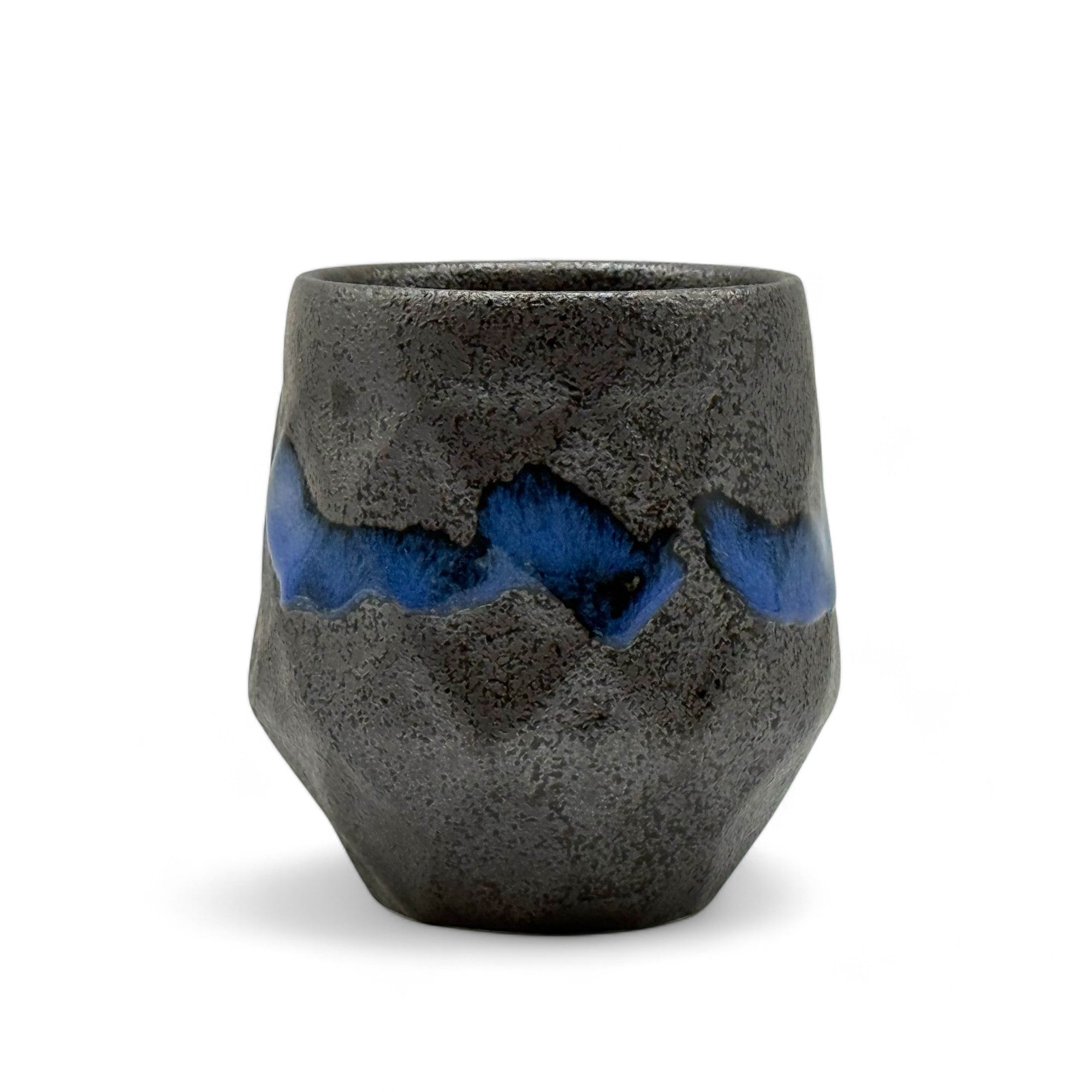 Handcrafted Mino-yaki Yunomi Japanese teacup with traditional glaze, perfect for daily tea rituals.