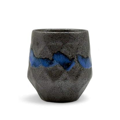 Handcrafted Mino-yaki Yunomi Japanese teacup with traditional glaze, perfect for daily tea rituals.