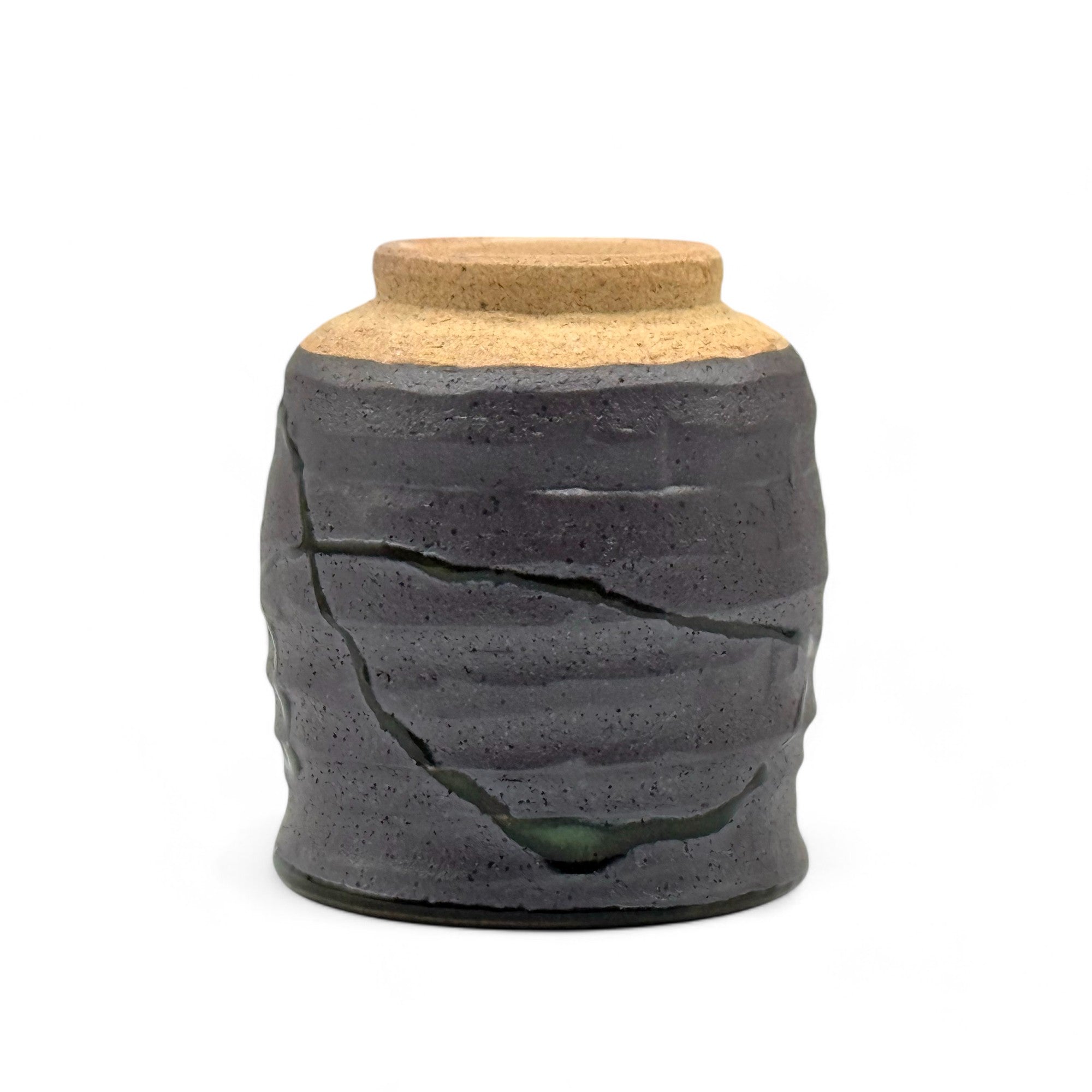 Handcrafted Mino-yaki Yunomi Japanese teacup with traditional glaze, perfect for daily tea rituals.