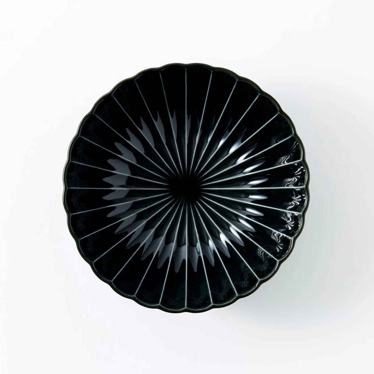 Kurokage large deep round bowl in ink black ceramic – elegant Japanese tableware for modern, minimalist dining.
