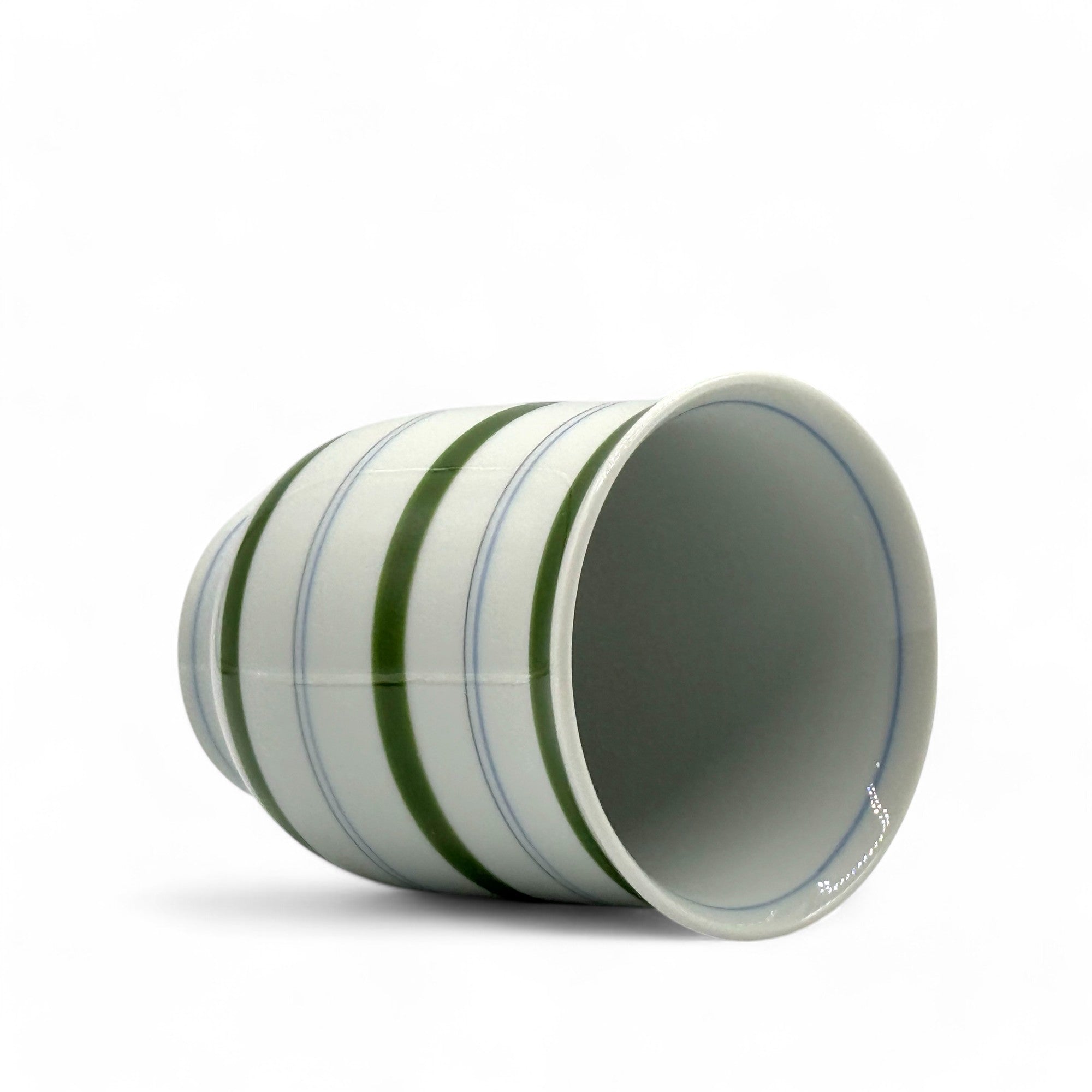 Handcrafted Hasami-yaki Yunomi Japanese teacup with traditional glaze, perfect for daily tea rituals.