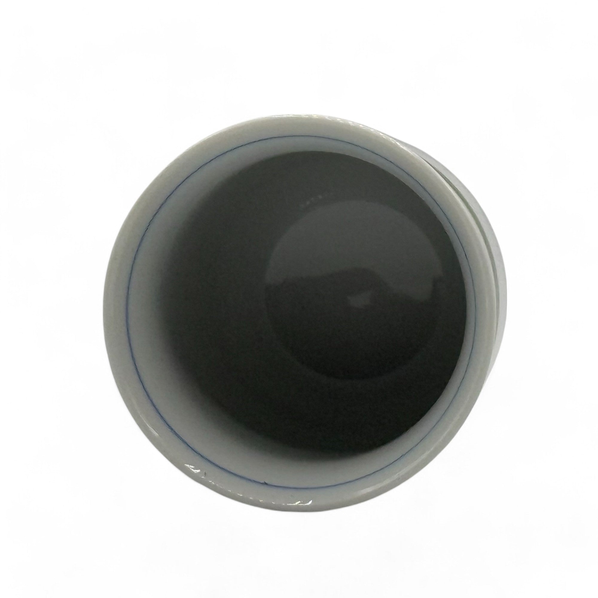 Handcrafted Hasami-yaki Yunomi Japanese teacup with traditional glaze, perfect for daily tea rituals.