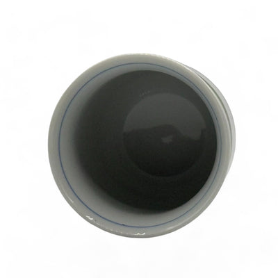 Handcrafted Hasami-yaki Yunomi Japanese teacup with traditional glaze, perfect for daily tea rituals.