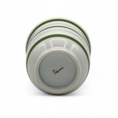 Handcrafted Hasami-yaki Yunomi Japanese teacup with traditional glaze, perfect for daily tea rituals.