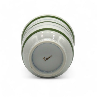 Handcrafted Hasami-yaki Yunomi Japanese teacup with traditional glaze, perfect for daily tea rituals.