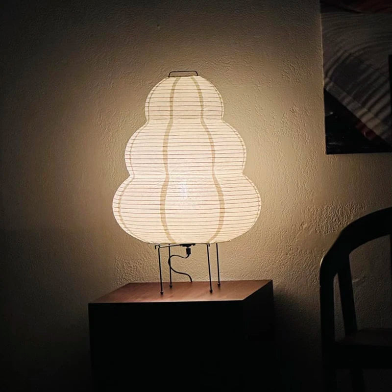 Minimalist Japanese Rice Paper Desk Lamp featuring LED light, perfect for cozy ambiance and stylish decor.