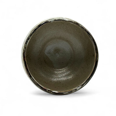 Gray Mino-yaki Japanese matcha bowl (chawan) with pouring spout, handmade ceramic bowl for whisking matcha tea and matcha lattes.