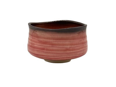 Handcrafted Mino-yaki Japanese matcha bowl (chawan) in pink glaze, traditional ceramic bowl for matcha tea ceremony and matcha preparation.