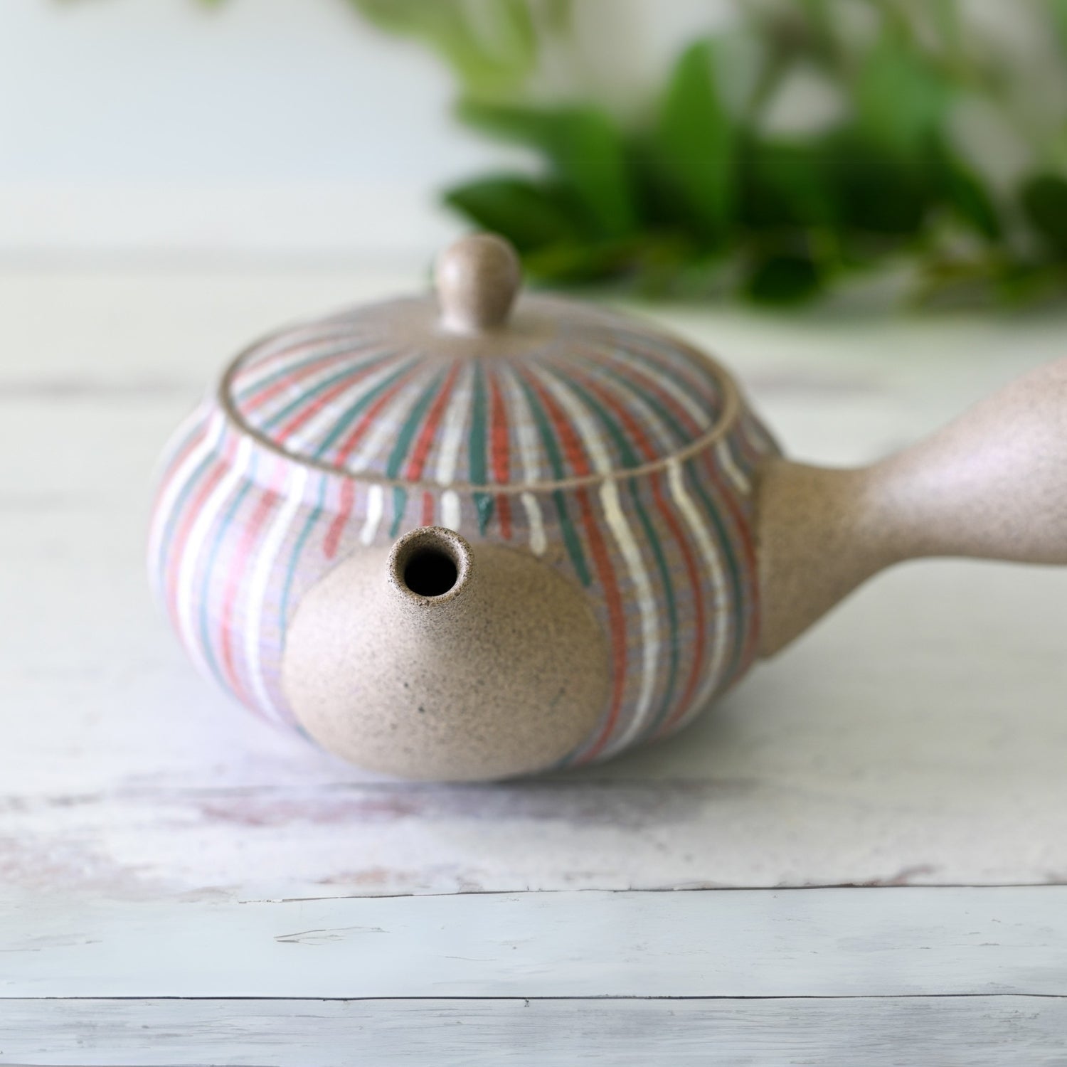Miyabi Striped Tokoname-Yaki Kyusu Teapot handcrafted in Japanese clay for authentic tea brewing.